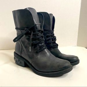Black, studded combat boots by Calvin Klein Jeans